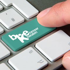 Symbolbild der Bundeskonferenz für Erziehungsberatung auf der Taste einer Computertastatur 